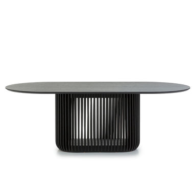 Showcasing Tenilo 2.2m Oval Dining Table - Black Stain DT10671-CU Dining Table by Calibre Furniturs